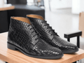 Introducing our handmade Men's Alligator Chukka Boots, featuring an elegant alligator print design. These dress lace up boots are perfect for any sophisticated gentleman looking to add a touch of luxury to their wardrobe. Elevate your style with these premium boots.