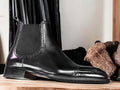 These stylish designer handmade Black Chelsae Brogue Boots are the perfect addition to any man's wardrobe. Crafted with quality leather and hand stitching, these boots provide a comfortable fit with a timeless look. They offer a sophisticated style with a unique embossed texture.