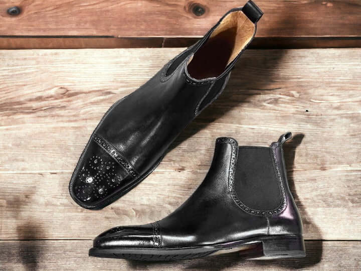 These stylish designer handmade Black Chelsae Brogue Boots are the perfect addition to any man's wardrobe. Crafted with quality leather and hand stitching, these boots provide a comfortable fit with a timeless look. They offer a sophisticated style with a unique embossed texture.