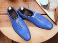 Expertly crafted with whole cut leather, these men's handmade blue dress shoes offer unparalleled style and quality. Elevate your wardrobe with 100% leather shoes that are designed for both comfort and sophistication. Step into luxury with these versatile and timeless shoes.