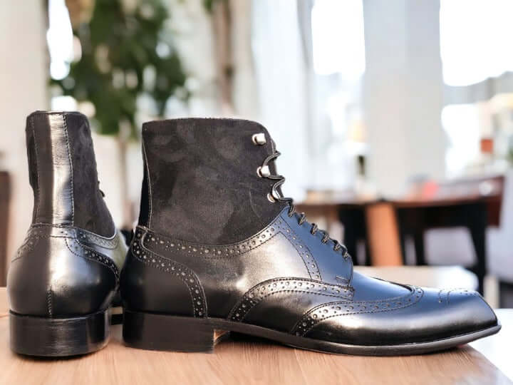 The Men Two Tone Boots combine a stylish and versatile black ankle leather with handcrafted design. Ideal for any formal occasion, these boots provide superior comfort and quality with their hand-crafted construction and luxurious leather material. Perfect for the sophisticated dresser.