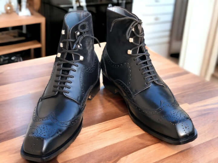 The Men Two Tone Boots combine a stylish and versatile black ankle leather with handcrafted design. Ideal for any formal occasion, these boots provide superior comfort and quality with their hand-crafted construction and luxurious leather material. Perfect for the sophisticated dresser.