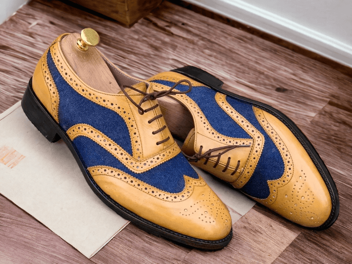 Handmade with a combination of tan blue leather and denim, these men's oxford shoes are both stylish and durable. Expertly crafted, they provide a unique blend of comfort and sophistication for any occasion. Invest in quality and elevate your footwear game with these handmade shoes.