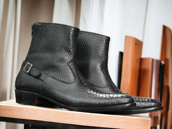 These luxurious Handmade Leather Ankle Boots are crafted from Black Python Print leather for a timeless look. Its superior quality gives it a comfortable fit while its handmade construction ensures long-lasting durability. Look and feel great with these stylish boots.