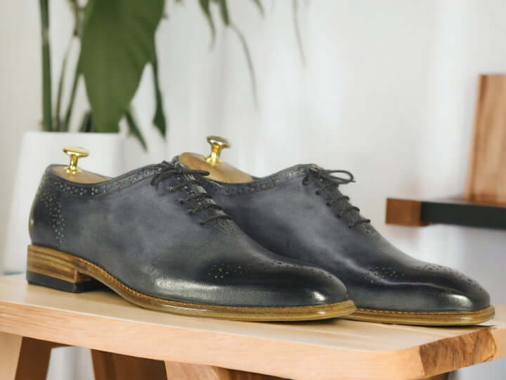 Enjoy the timeless style of these Handmade Grey Leather Shoes. Crafted with a Whole Cut Lace Up design and premium leather, they are perfect for dressing up or down. Perfectly polished, these dress shoes will ensure you look your best.