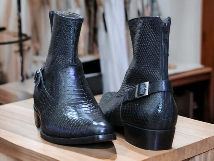 These luxurious Handmade Leather Ankle Boots are crafted from Black Python Print leather for a timeless look. Its superior quality gives it a comfortable fit while its handmade construction ensures long-lasting durability. Look and feel great with these stylish boots.