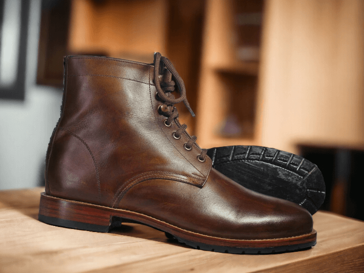 Expertly handcrafted, these Ankle High Brown Lace Up Leather Boots are a stylish addition to any wardrobe. The side lace-up design offers both fashion and function, ensuring a perfect fit every time. Made from high-quality leather, these boots are perfect for any occasion and are sure to elevate your style.