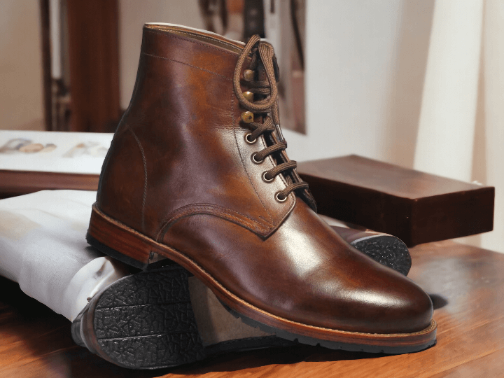 Expertly handcrafted, these Ankle High Brown Lace Up Leather Boots are a stylish addition to any wardrobe. The side lace-up design offers both fashion and function, ensuring a perfect fit every time. Made from high-quality leather, these boots are perfect for any occasion and are sure to elevate your style.