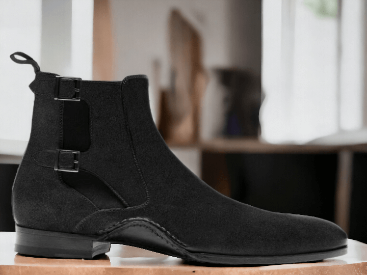 Upgrade your shoe game with our Bespoke Handmade Black Suede Buckle Chelsea Boots. These Dress Formal Slip On Boots are perfect for any formal occasion, providing both style and comfort. Crafted with high-quality materials, these ankle high boots will elevate any outfit. Expertly designed for men's fashion, these boots are a must-have for any wardrobe.