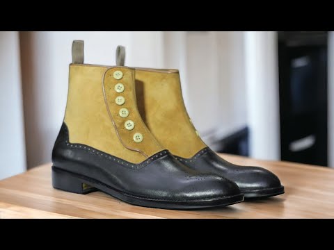 Expertly crafted for the modern man, our Men's Black Button Top Boots offer a sleek and sophisticated style. Handmade with high-quality materials, these two-tone boots feature a unique button top design and ankle height for a comfortable fit. Elevate any outfit with these bold and stylish boots.