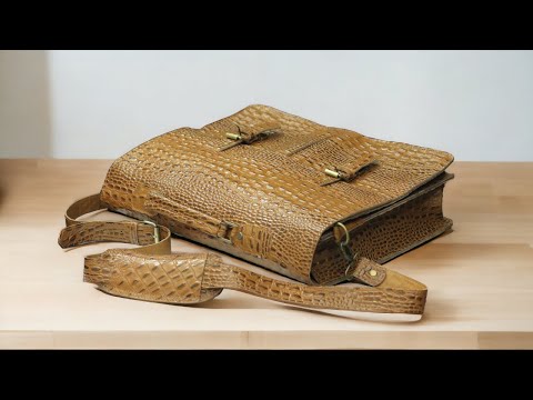 Expertly crafted with genuine alligator print leather, this handmade tan bag is perfect for the office or daily use. Its spacious design can accommodate a laptop, making it the ideal choice for tech-savvy professionals. A sophisticated and stylish choice for men, this bag is sure to elevate any outfit.