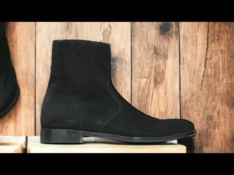 Expertly crafted with cow-hide leather and suede, these black ankle boots are the perfect combination of quality and style. Handmade by skilled artisans, these boots are designed for the winter season, providing warmth and durability. Elevate your footwear collection with these versatile and timeless boots.